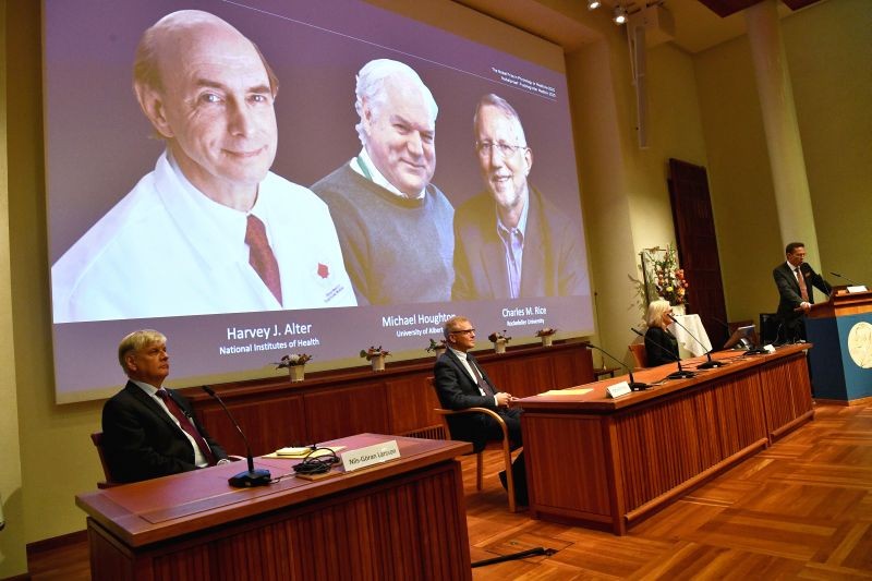 Thomas Perlmann, Secretary of the Nobel Assembly at Karolinska Institutet and of the Nobel Committee for Physiology or Medicine, announces Harvey J Alter, Michael Houghton and Charles M Rice as the winners of the 2020 Nobel Prize in Physiology or Medicine during a news conference at the Karolinska Institute in Stockholm, Sweden, October 5, 2020.  (REUTERS Photo)