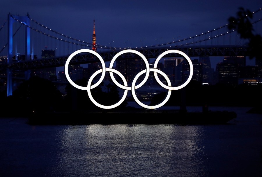 FILE PHOTO: The giant Olympic rings are pictured two days before the start of the one-year countdown to the Tokyo Olympics that have been postponed to 2021 due to the coronavirus disease (COVID-19) outbreak, at the waterfront area at Odaiba Marine Park in Tokyo, Japan July 21, 2020. REUTERS/Issei Kato/File photo