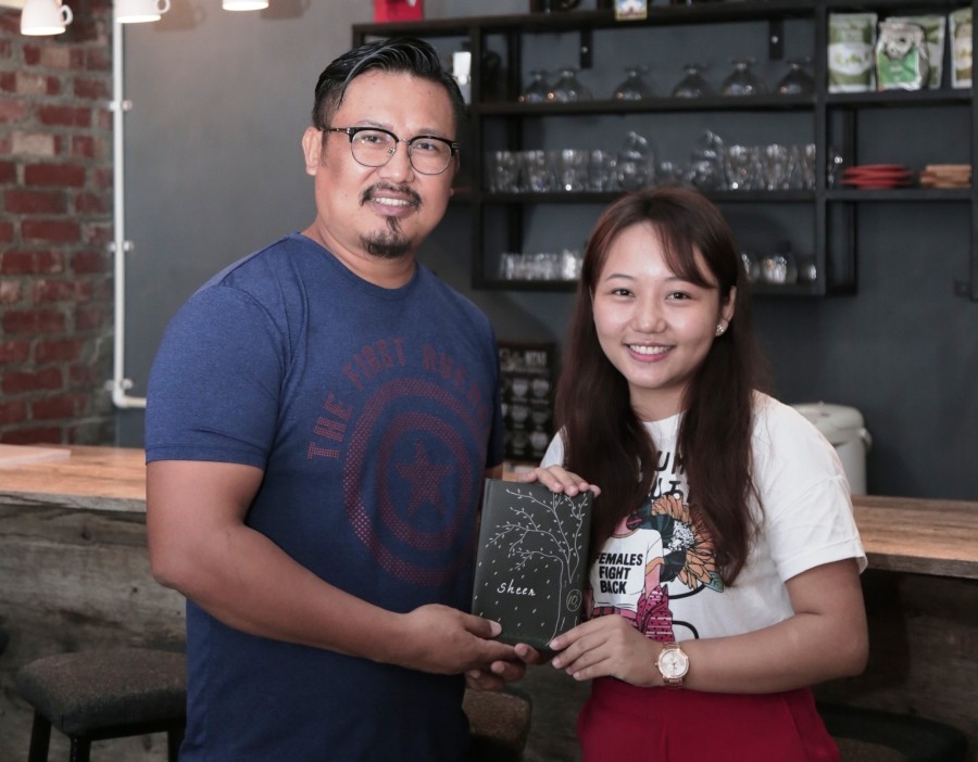 Sentikala M Lemtur with by Wabang Longchari, Lead Pastor, The Lighthouse Church during the release of the book ‘Sheer’ at Café Leon, Dimapur on October 21.