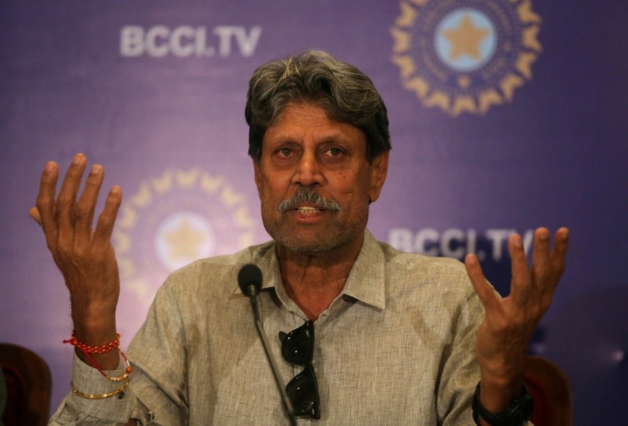 Kapil Dev, former Indian cricket captain and a member of the country's cricket board BCCI's Cricket Advisory Committee, speaks during a news conference to announce its team's coach, in Mumbai, August 16, 2019. REUTERS/Francis Mascarenhas/File Photo