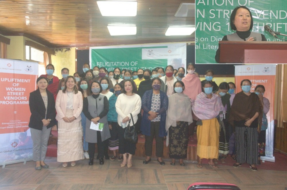 Women street vendors along with Entrepreneurs Associates (EA) officials during a during felicitation programme under PM SVANidhi in Kohima on October 29. (Inset) Nino Iralu, Secretary (Judicial), Law and Justice Department speaking at the event. (Morung Photo)