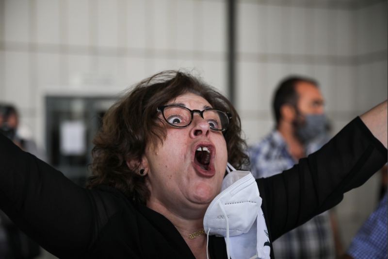 Magda Fyssa mother of anti-racist Greek rapper Pavlos Fyssas, who was killed in 2013 by Golden Dawn supporter Giorgos Roupakias, reacts ahead of a trial of leaders and members of the far-right Golden Dawn party, in Athens, Greece on October 7, 2020. (REUTERS Photo)