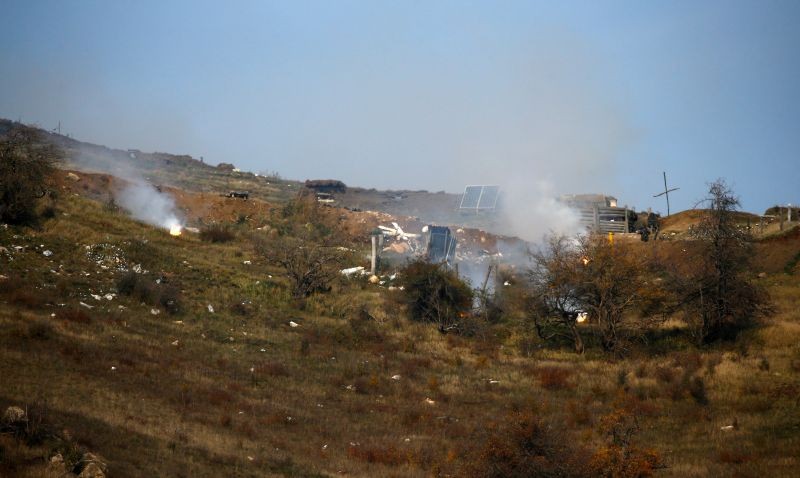 Smoke rises above the fighting positions of ethnic Armenian soldiers following an artillery attack on the front line in the course of a military conflict against Azerbaijan's armed forces in the breakaway region of Nagorno-Karabakh, October 20, 2020. (REUTERS Photo)