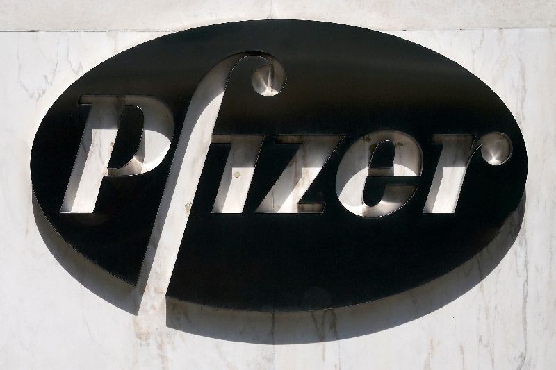 FILE PHOTO: FILE PHOTO: A sign is pictured outside Pfizer Headquarters in the Manhattan borough of New York City, New York, U.S., July 22, 2020. REUTERS/Carlo Allegri/File Photo/File Photo