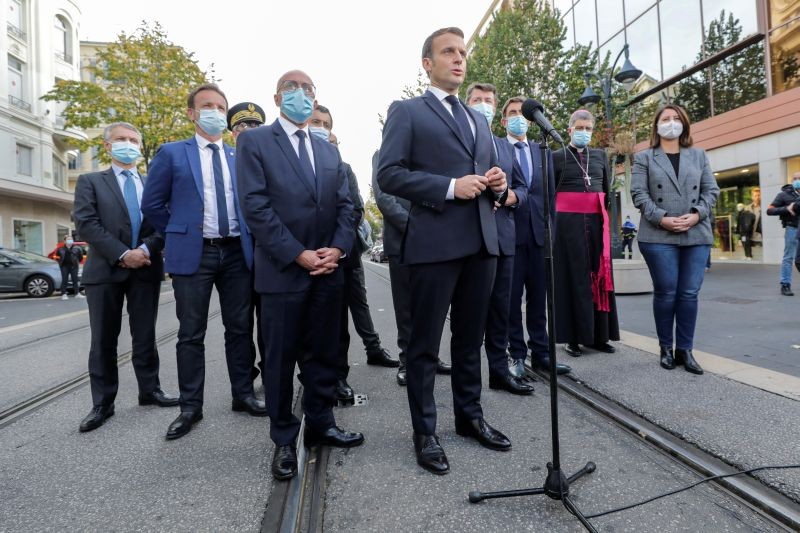 French President Emmanuel Macron speaks to the media during the visit to the scene of a knife attack at Notre Dame church in Nice, France October 29, 2020. (REUTERS Photo)