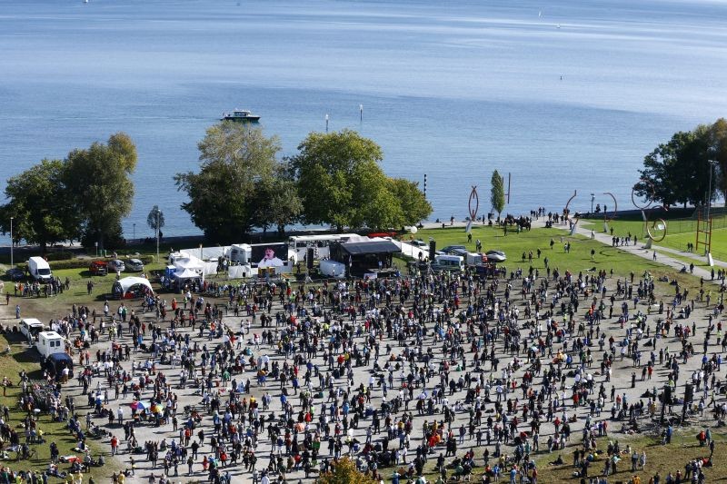 A general view taken from a wheel shows people gathering during a protest against the government's restrictions, amid the coronavirus disease (COVID-19) outbreak, in Konstanz, Germany on October 4, 2020. (REUTERS Photo)