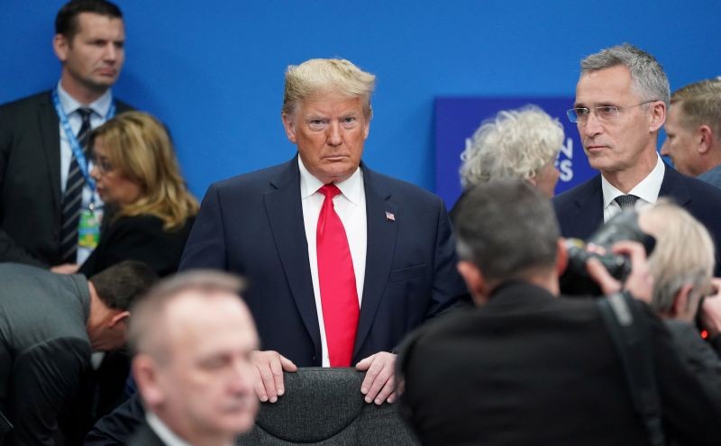 U.S. President Donald Trump stands among other leaders as he attends a North Atlantic Treaty Organization Plenary Session at the NATO summit in Watford, near London, Britain, December 4, 2019. (REUTERS File Photo)