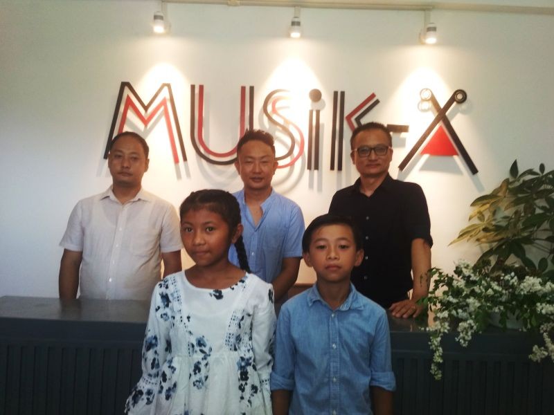 (Background from right) Advisor, TaFMA, Theja Meru, Alobo Naga and SDO (C) Chümoukedima, Thejavizo Nakhro, along with two music students at the opening of the new branch of Musik-A at Chümoukedima town on October 10.