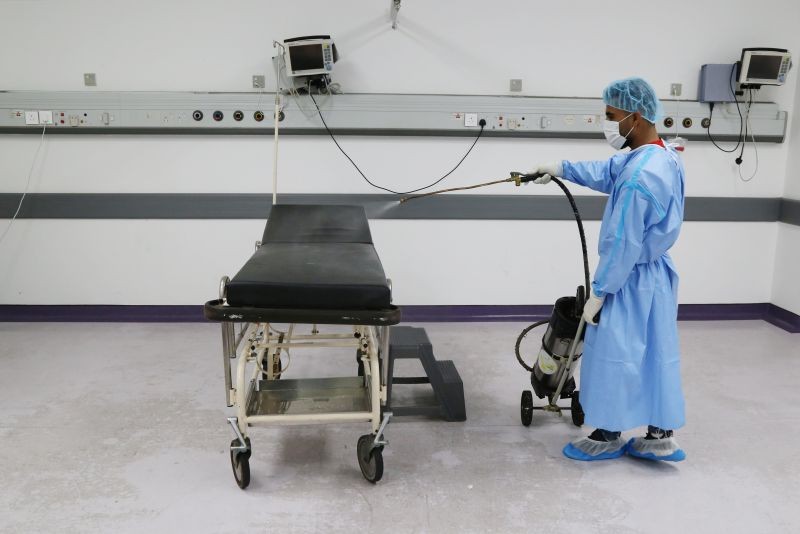A worker disinfects a room where patients undergo tests for the coronavirus disease (COVID-19), at Rafik Hariri University Hospital in Beirut, Lebanon October 1, 2020. (REUTERS Photo)