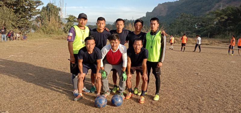 Champions Rush Hour FC with match officials.