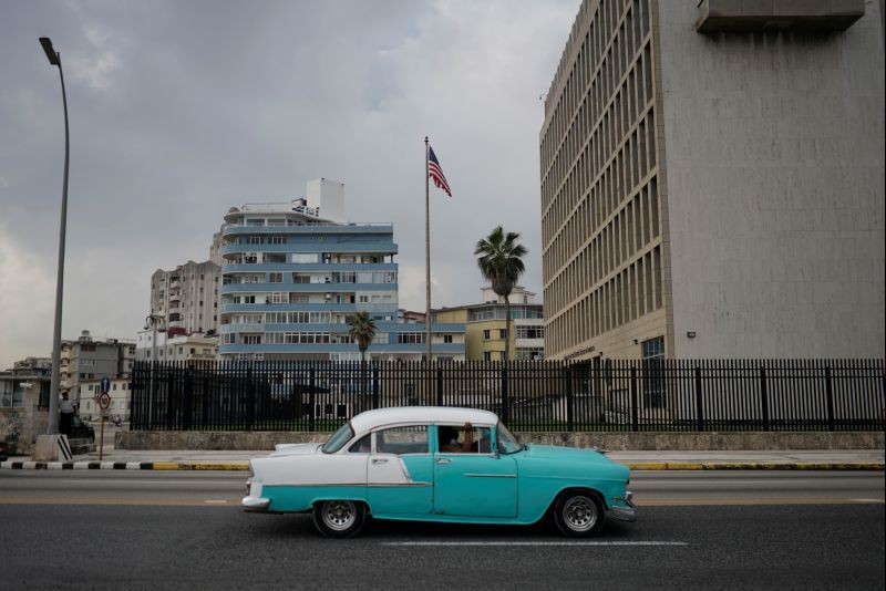 A vintage car passes by the U.S. Embassy in Havana, Cuba, October 30, 2020. Picture taken October 30, 2020. (REUTERS File Photo)