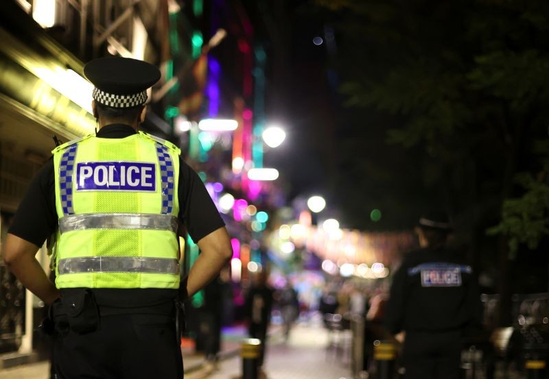 Police officers stand guard in the street before a local lockdown amidst the spread of the coronavirus disease (COVID-19) in Manchester, Britain October 22, 2020. (REUTERS File Photo)