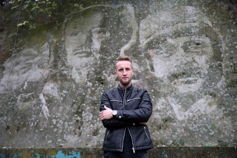 Mirsad Zahirovic, District Team founder and activist poses for a photo in front of a mural in Brcko, Bosnia and Herzegovina November 12, 2020. Picture taken November 12, 2020. (REUTERS Photo)