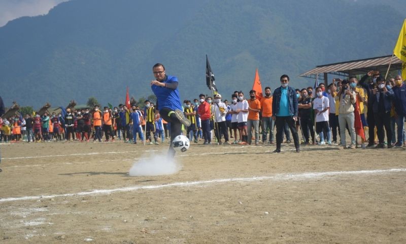 Tuensang DC, Kumar Ramnikant, IAS, kicks off the 28th Loyem Memorial Penalty Shootout at Loyem Memorial Ground, Tuensang on November 19. (DIPR Photo)
