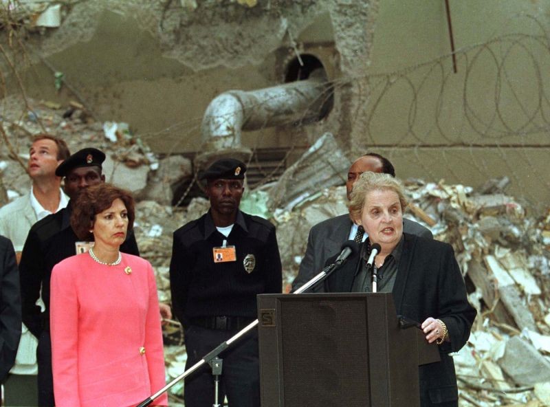 U.S. Secretary of State Madeleine Albright (R) and Ambassador to Kenya Prudence Bushne (L) address Kenyan's at the bomb-damaged area near the U.S. Embassy in Nairobi August 18, 1998. (REUTERS File Photo)