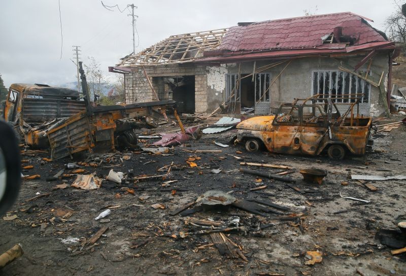 A view shows burnt vehicles and a damaged building on the outskirts of Shusha (Shushi) in the region of Nagorno-Karabakh, November 13, 2020. (REUTERS Photo)
