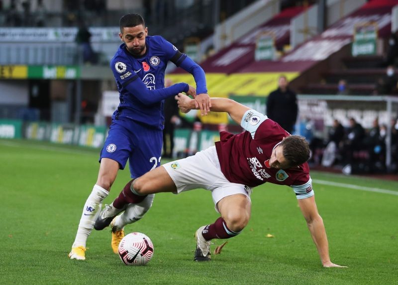 Chelsea's Hakim Ziyech in action with Burnley's James Tarkowski Pool via REUTERS/Molly Darlington