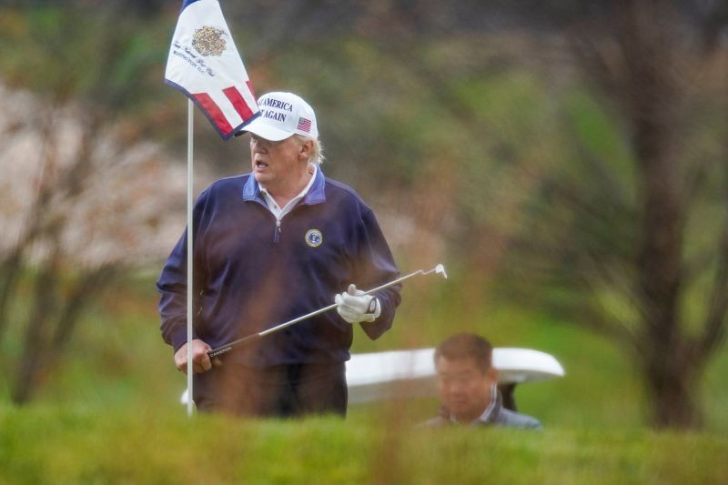 U.S. President Donald Trump plays golf at the Trump National Golf Club in Sterling, Virginia, U.S., November 15, 2020. REUTERS/Joshua Roberts