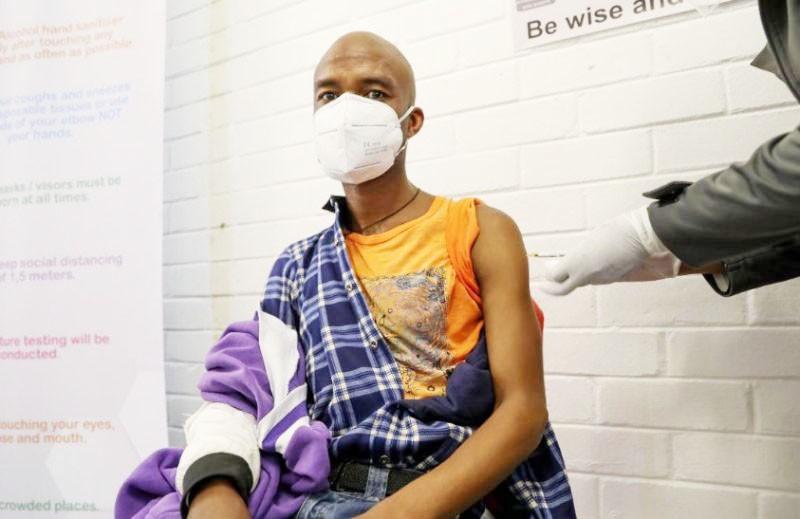 A volunteer receives an injection from a medical worker during the country's first human clinical trial for a potential vaccine against the novel coronavirus, at the Baragwanath hospital in Soweto, South Africa on June 24, 2020. (REUTERS File Photo)