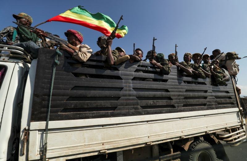 Members of Amhara region militias ride on their truck as they head to face the Tigray People's Liberation Front (TPLF), in Sanja, Amhara region near a border with Tigray, Ethiopia November 9, 2020. (REUTERS File Photo)