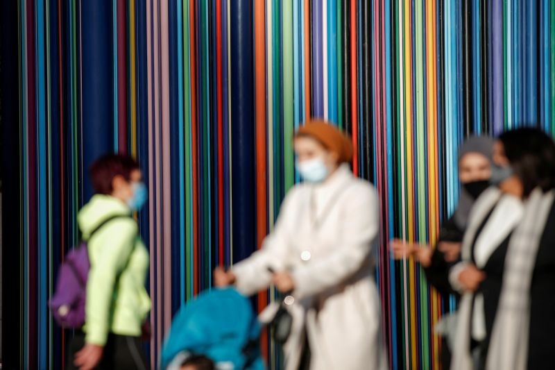 Women wearing protective face masks walk at the financial and business district of La Defense, amid the outbreak of the coronavirus disease (COVID-19), in Paris, France, November 9, 2020. (REUTER File Photo)