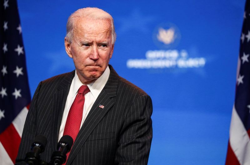 U.S. President-elect Joe Biden speaks to reporters following an online meeting with members of the National Governors Association (NGA) executive committee in Wilmington, Delaware, U.S., November 19, 2020. REUTERS/Tom Brenner