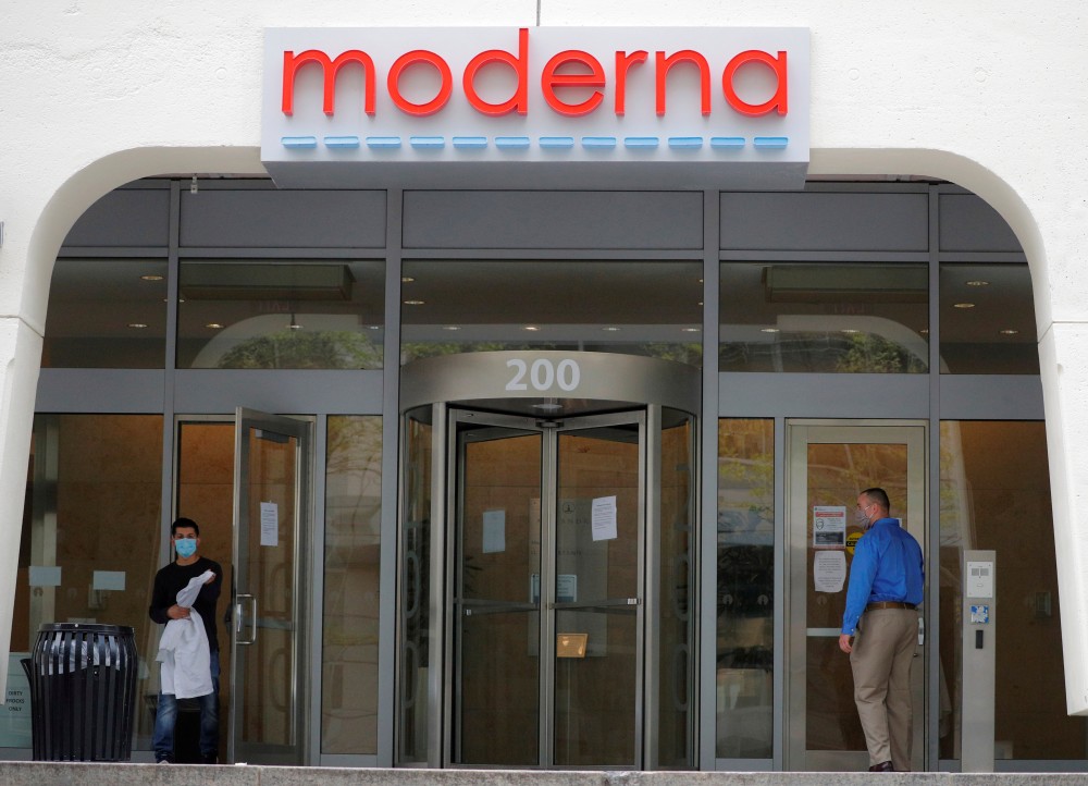 FILE PHOTO: A sign marks the headquarters of Moderna Therapeutics, which is developing a vaccine against the coronavirus disease (COVID-19), in Cambridge, Massachusetts, U.S., May 18, 2020. REUTERS/Brian Snyder/File Photo