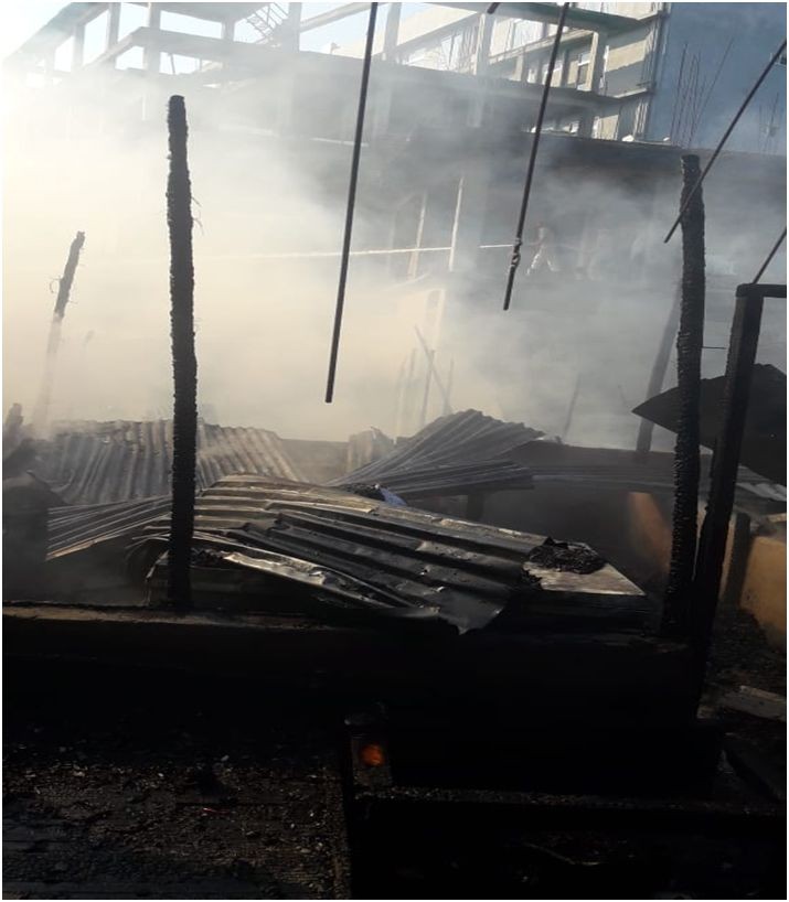 Fire personnel dousing the fire at Purana Bazar, near Hollohon Petrol Pump, Dimapur on November 16.