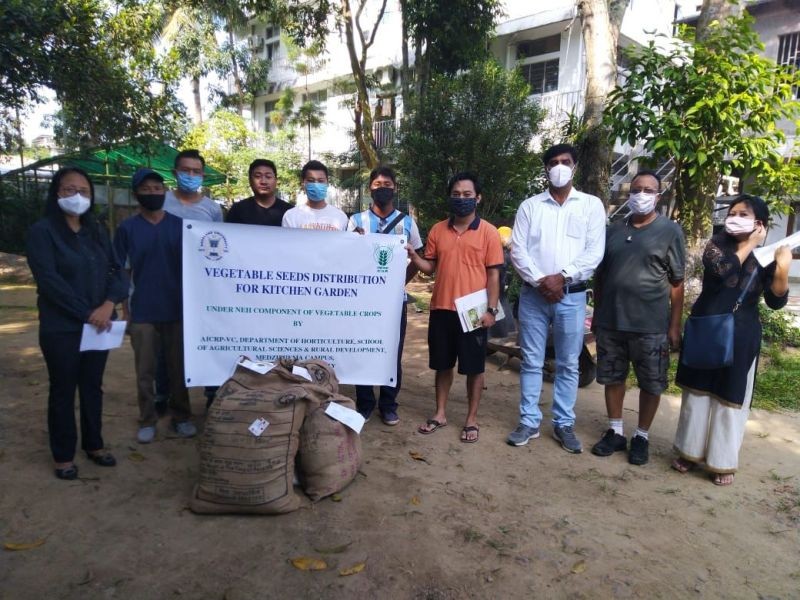 A framer receives seed during the distribution programme on winter vegetables in Duncan Basti, Dimapur.
