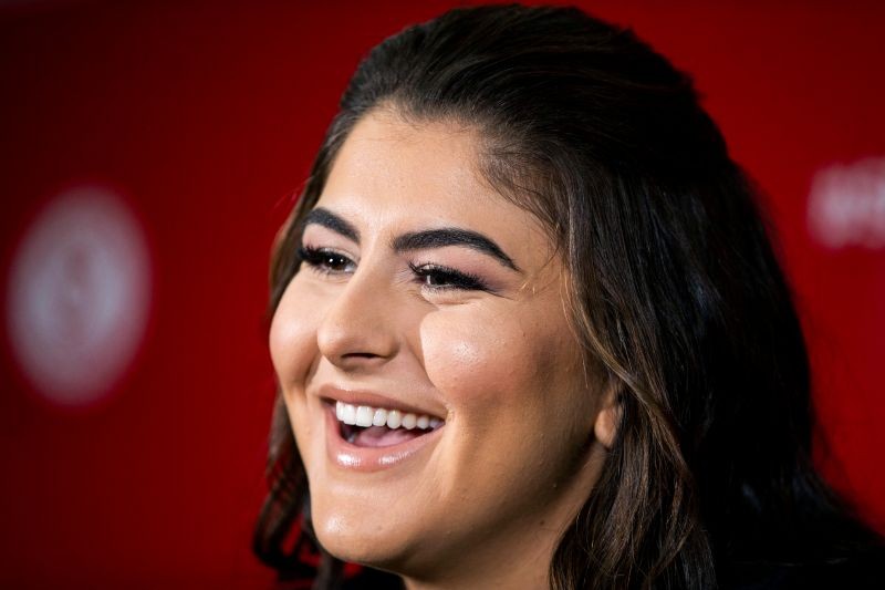 Canadian tennis player Bianca Andreescu speaks with the news media about her win at the U.S. Open, after arriving in Toronto, Ontario, Canada September 11, 2019. REUTERS/Carlos Osorio/Files