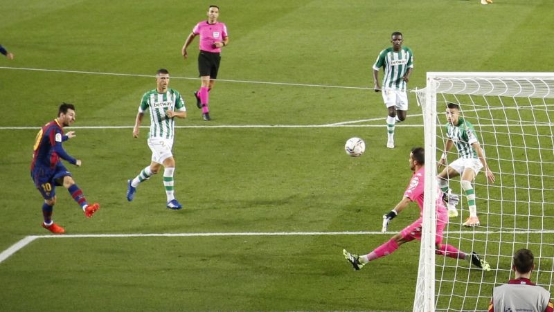 Barcelona's Lionel Messi scores their fourth goal REUTERS/Albert Gea