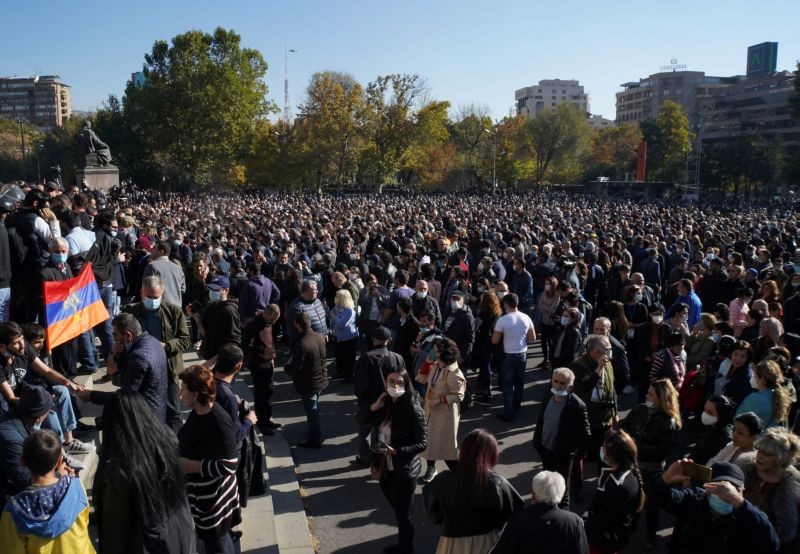 People attend an opposition rally to demand the resignation of Armenian Prime Minister Nikol Pashinyan following the signing of a deal to end the military conflict over the Nagorno-Karabakh region, in Yerevan, Armenia November 11, 2020. (REUTERS Photo)