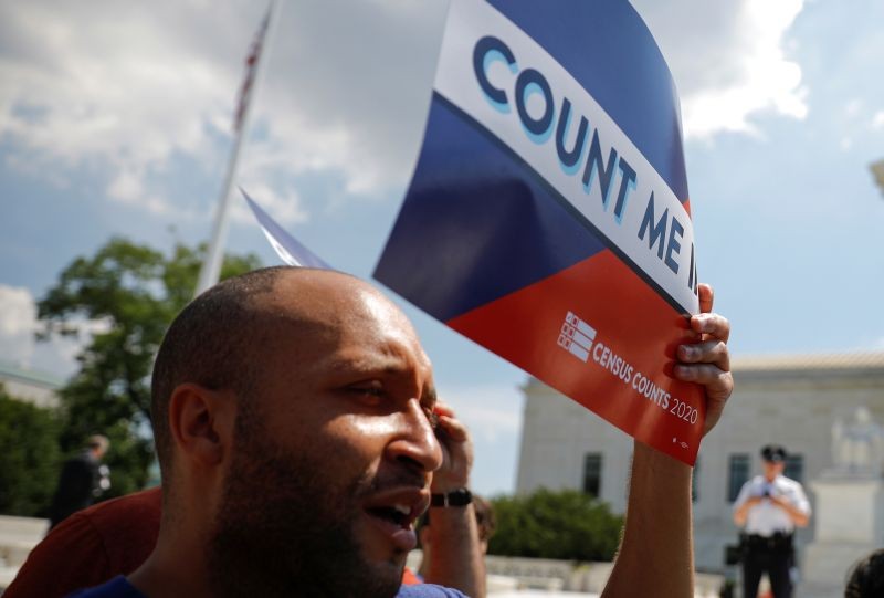 A protester holds a sign outside the U.S. Supreme Court where the court ruled that U.S. President Donald Trump's administration did not give an adequate explanation for its plan to add a citizenship question to the 2020 census, delivering a victory to New York state and others challenging the proposal in Washington, U.S., June 27, 2019. (REUTERS File Photo)