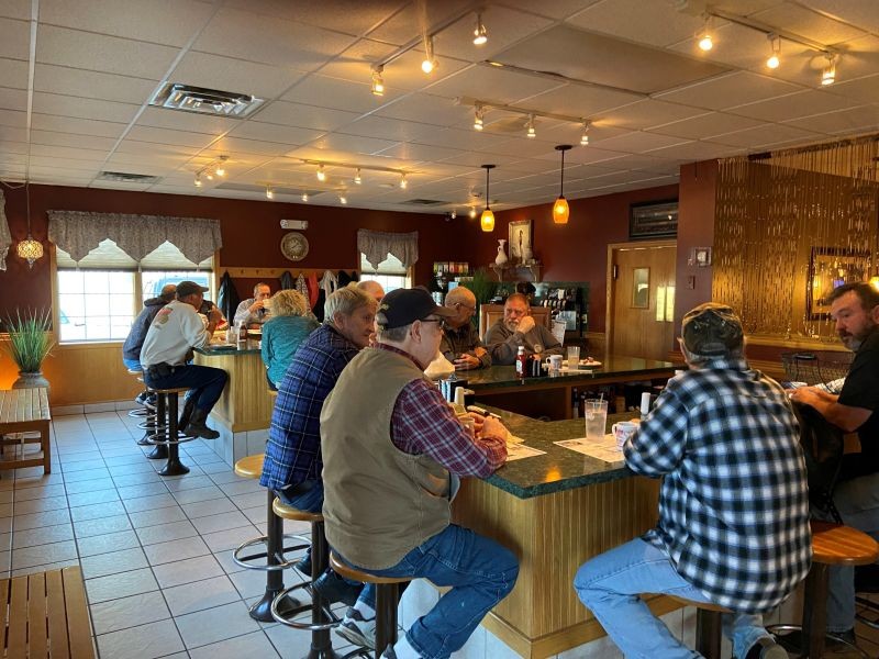 Customers sit at The Bread of Life Restaurant shortly before major TV networks projected Joe Biden had defeated Donald Trump in the U.S. presidential election, in McAlisterville, Juniata County, Pennsylvania on November 7, 2020. Trump won 87 percent of the vote in Juniata County. Picture taken November 7, 2020. REUTERS/Nathan Layne