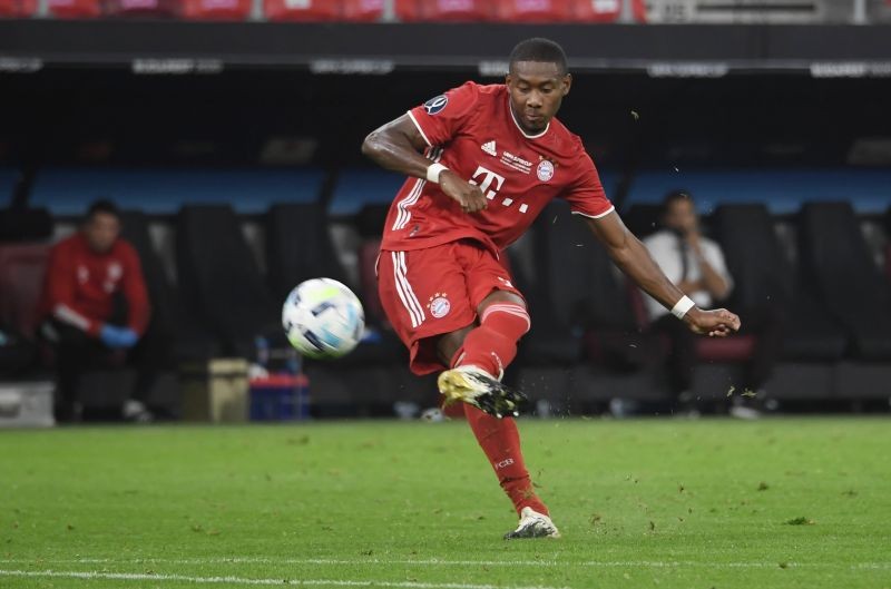 Bayern Munich's David Alaba shoots at goal from a free kick. Pool via REUTERS/Attila Kisbenedek