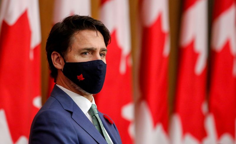 Canadian Prime Minister Justin Trudeau listens while wearing a mask at a news conference held to discuss the country's coronavirus disease (COVID-19) response in Ottawa, Ontario, Canada November 6, 2020. (REUTERS File Photo)