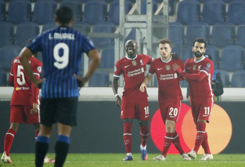 Liverpool's Diogo Jota celebrates scoring their second goal with Sadio Mane and Mohamed Salah REUTERS/Alessandro Garofalo