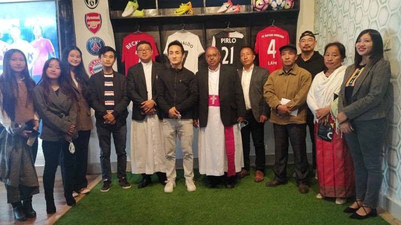 Most Rev Dr James Thoppil, Bishop, Diocese of Kohima seen with Dikhri Wezah and others during the opening of Soccer Cafe on November 28. (Morung Photo)