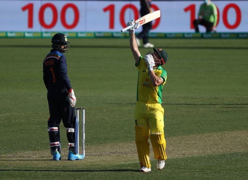 Australia's Aaron Finch celebrates his century REUTERS/Loren Elliott