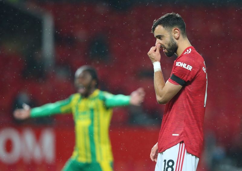 Manchester United's Bruno Fernandes reacts after the referee confirms his penalty will be retaken Pool via REUTERS/Alex Livesey