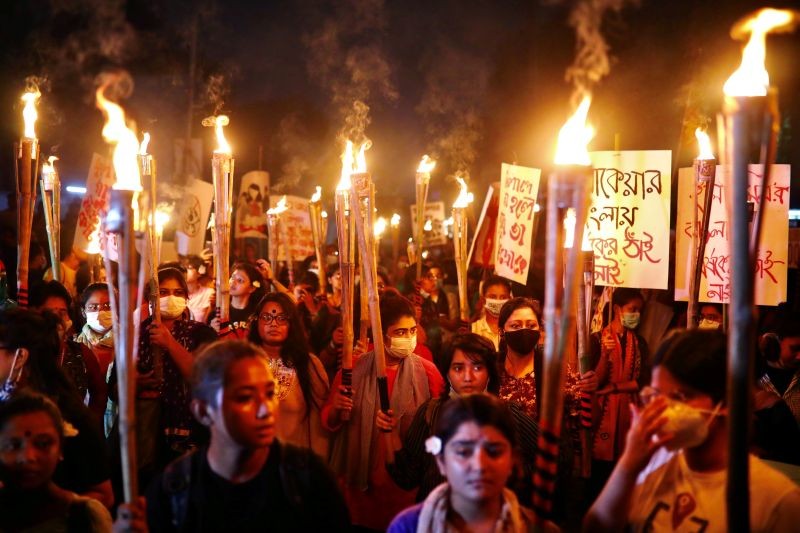 Female activists and students take part in a torch procession demanding women's safety and justice for rape victims, amid the coronavirus disease (COVID-19) outbreak in Dhaka, Bangladesh, October 14, 2020. (REUTERS File Photo)
