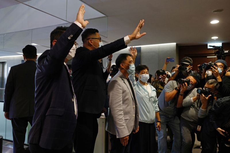 Pro-democracy legislators Helena Wong, Wu Chi-wai, Andrew Wan and Lam Cheuk-ting wave to media after handing in their resignation letters as four pan-democratic legislators were disqualified when Beijing passed a new dissent resolution in Hong Kong, China November 12, 2020. (REUTERS Photo)