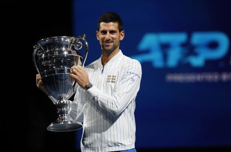 FILE PHOTO: Serbia's Novak Djokovic poses with the ATP Tour Number 1 trophy Action Images via Reuters/Paul Childs/File photo