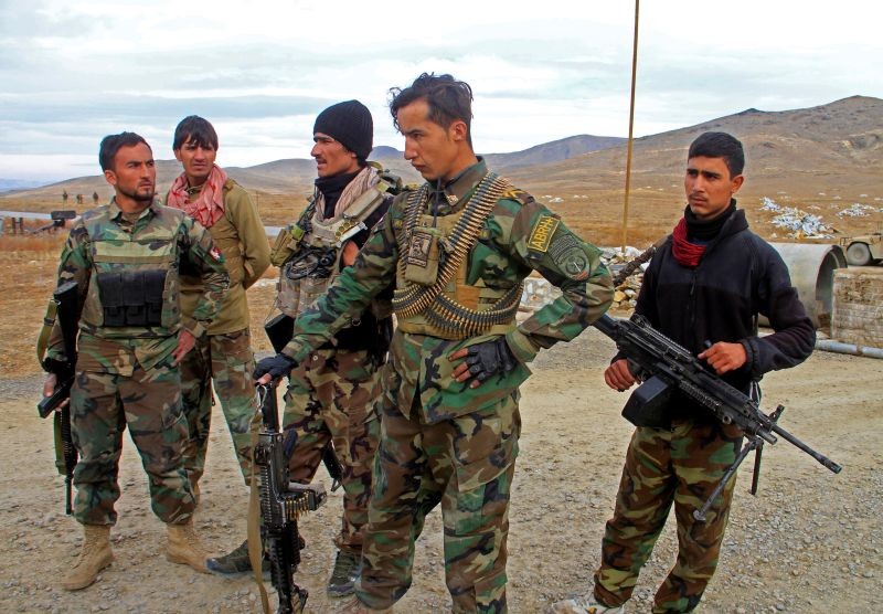 Afghan National Army soldiers keep watch outside of a military compound after a car bomb blast on the outskirts of Ghazni city, Afghanistan November 29, 2020. (REUTERS Photo)