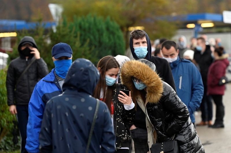 People wait for their results after tests at a coronavirus disease (COVID-19) testing site during nationwide testing, in Trencin, Slovakia October 31, 2020. (REUTERS File Photo)