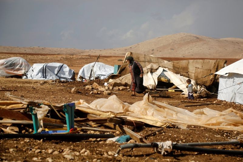A Palestinian woman walks in Khirbet Humsah in Jordan Valley in the Israeli-occupied West Bank November 5, 2020. (REUTERS Photo)