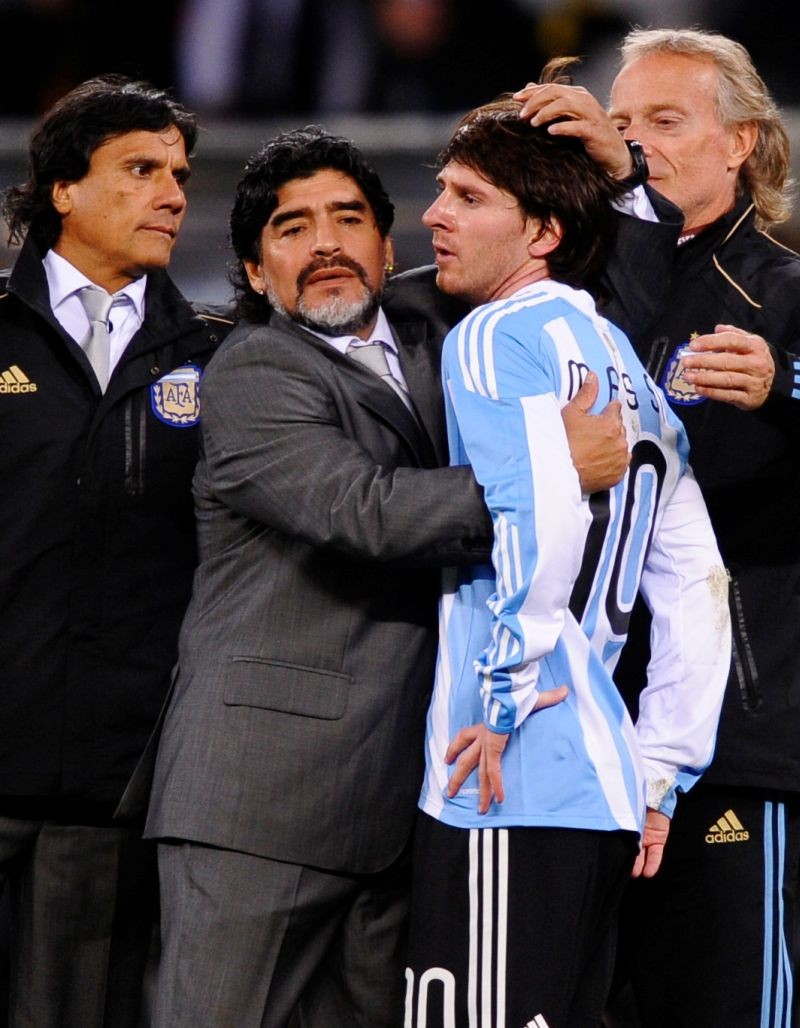 FILE PHOTO: Football - Germany v Argentina FIFA World Cup Quarter Final - South Africa 2010 - Green Point Stadium, Cape Town, South Africa - 3/7/10 Argentina coach Diego Maradona and Lionel Messi (R) look dejected at the end of the match after failing to reach the semi finals   Mandatory Credit: Action Images / Jason Cairnduff   Livepic/File Photo