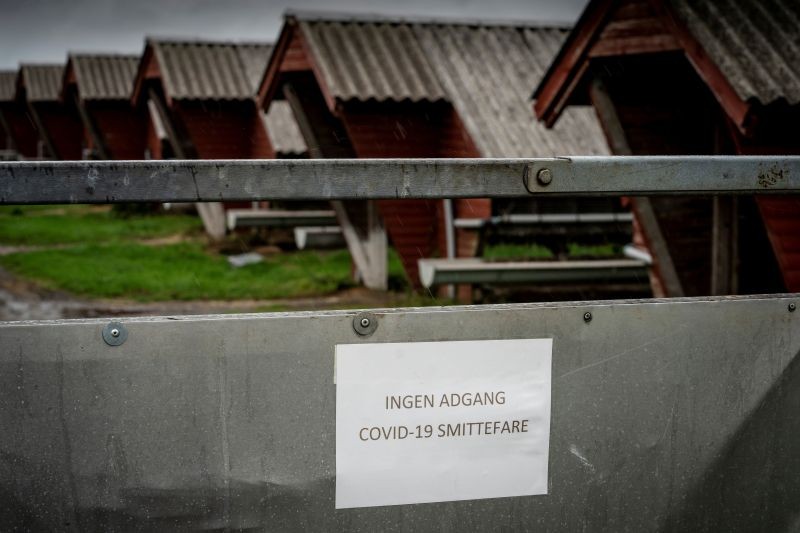 A sign in Danish warns "No access. Risk of infecting COVID-19" at a mink farm in Hjoerring in North Jutland, Denmark October 8, 2020. Picture taken October 8, 2020. (REUTERS File Photo)