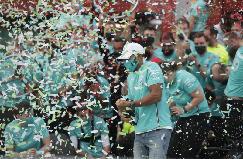 Race winner Lewis Hamilton as the Mercedes team celebrate winning the constructors championships Pool via Reuters/Luca Bruno