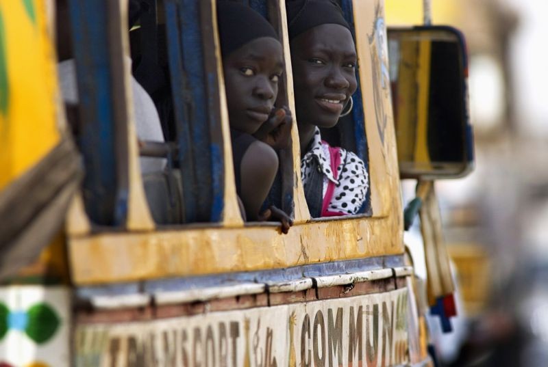 Passengers travel in a bus locally known as "car rapide" in Senegal's capital Dakar, July 16, 2008. Chaotic transport is part of life in West Africa, but getting to work may become even harder as skyrocketing fuel prices ignite protests by bus and taxi drivers, squeeze family budgets and increase social tensions. (REUTERS File Photo)